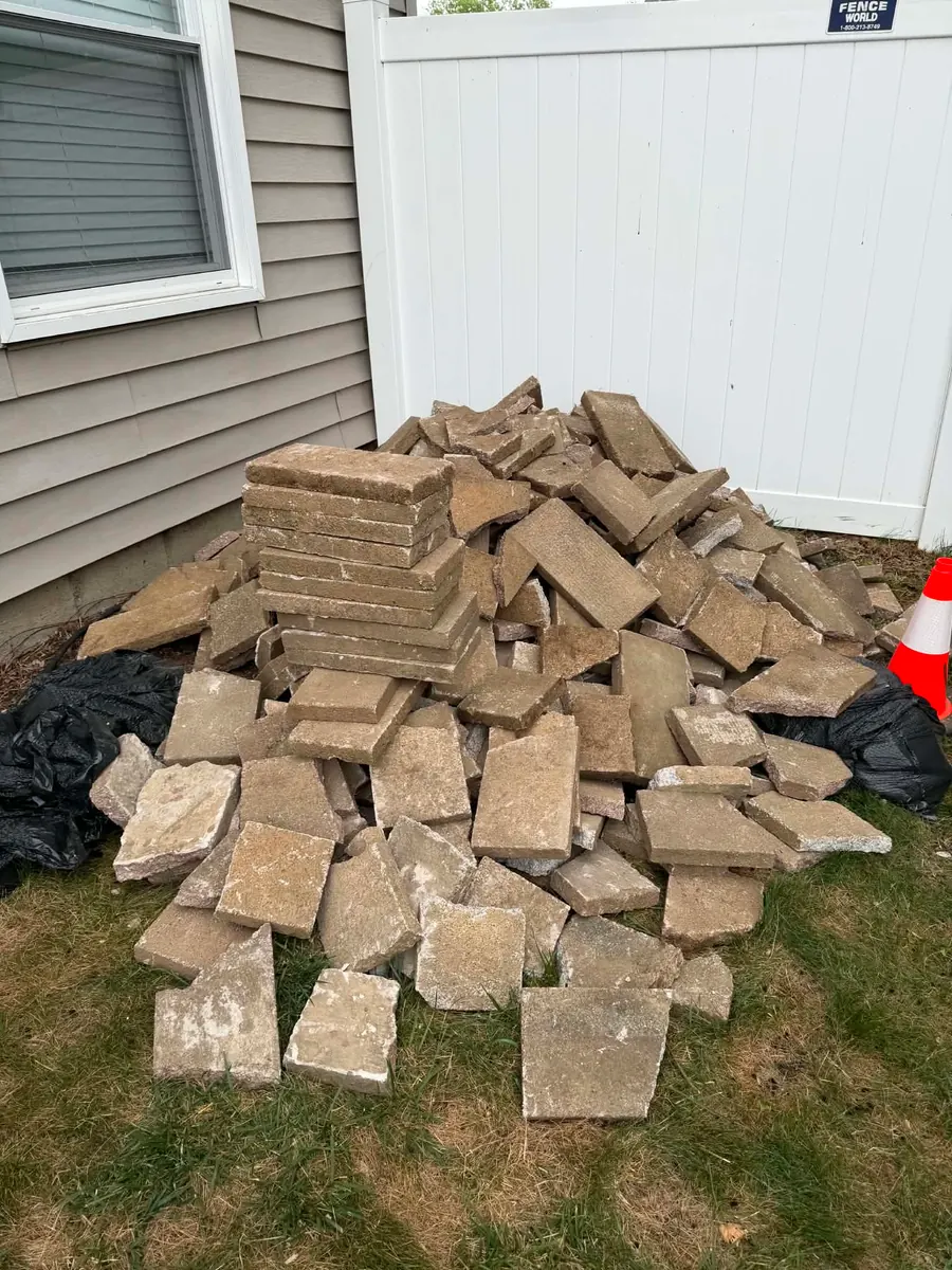 Property cleanout in progress by Hero's Junk Removal